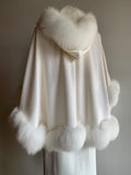 Cashmere, renard, fox, arctic, shawl, cape, wrap, stole, sleeveless, winter, fall, pictures, bride, bridesmaid, bridal party, bachelorette, bridal shower, maid of honour, Canadian heritage, montreal, local, high quality, international shipping, shipping, usa, europe, heritage gallery, heritage galerie, www.heritagegallery.ca, furrier, genuine, real fur, fur, custom, quality, handmade, made to measure, eco friendly, green fur, recycled fur, manufactured, made in canada, canadian, white, ivory, hood, blanc