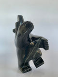 Soapstone, sculpture, carving, inuit, serpentine, green, inukshuk, seal, phoque, loon, bird, handcrafted, made in canada,canadian, Canadian made, Canadian heritage,montreal, old port, local, high quality, international shipping, shipping, usa, europe, heritage gallery, heritage galerie, www.heritagegallery.ca, cape doest, iqualuit, native, polar bear, igloo, eskimo, north, art stone, marble, rock, artist, drummer, dancing, man, caribou bone, Hunter, black, dark, Abe Simonie, inukshuk